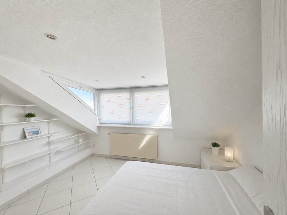 Schlafzimmer DG Mehrfamilienhaus Karlsruhe