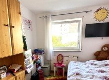 Kinderzimmer Attraktive Erdgeschosswohnung mit �berdachter Terrasse 
und eigenem Garten.