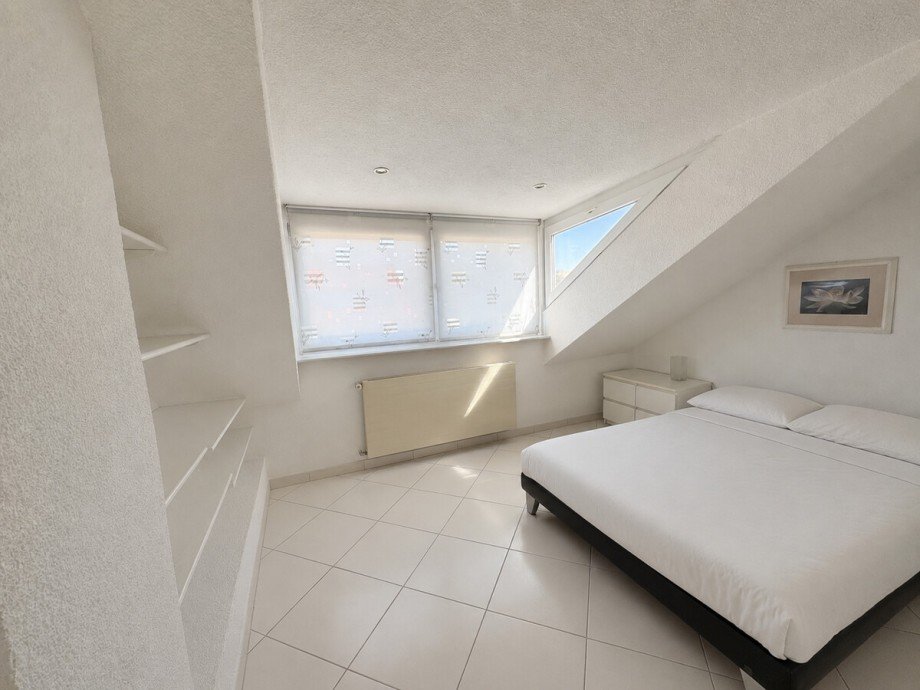 Schlafzimmer DG Mehrfamilienhaus Karlsruhe