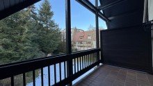 Balkon Helle Dachgeschosswohnung mit Panoramafenster, 
Waldblick und Tiefgaragenstellplatz.