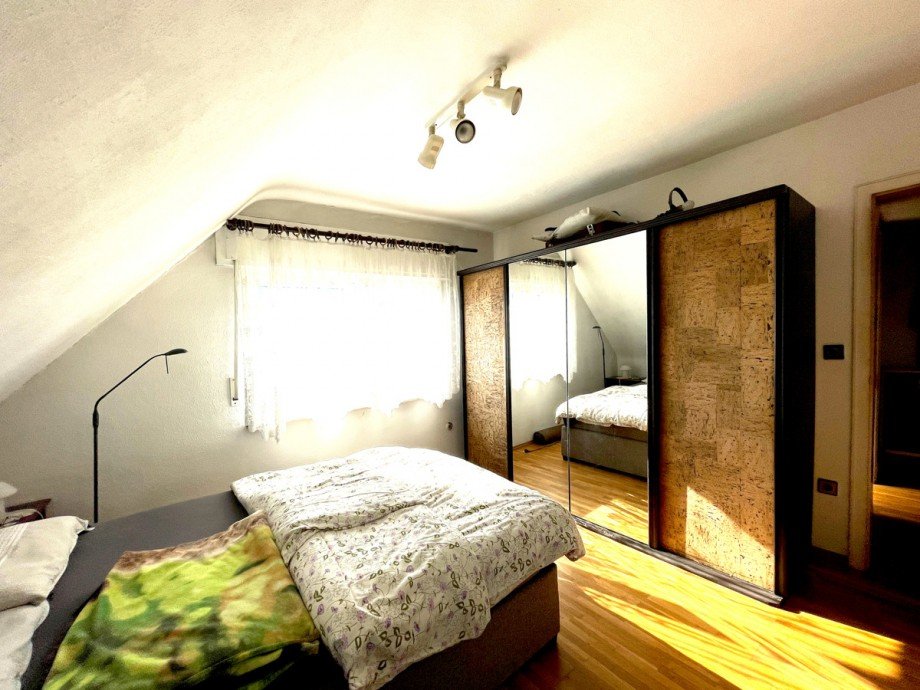 Schlafzimmer DG Einfamilienhaus Ettlingen-Sch�llbronn